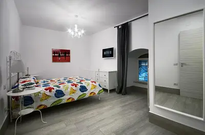 Letto o letti in una camera di Chiatamone Seaside Suite