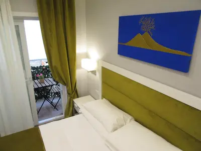 Letto o letti in una camera di Gea suite