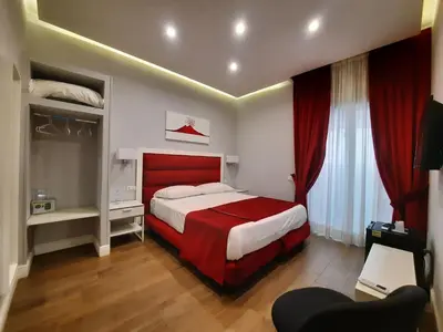 Letto o letti in una camera di Gea suite