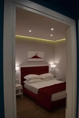 Letto o letti in una camera di Gea suite