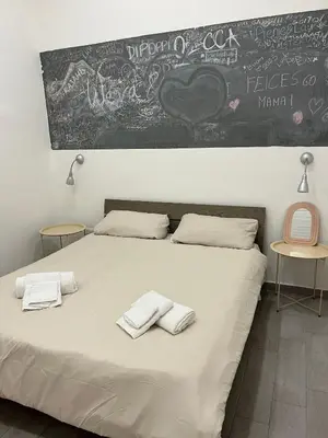 Letto o letti in una camera di Bassetto 013