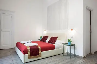 Letto o letti in una camera di B&B Martucci Avenue