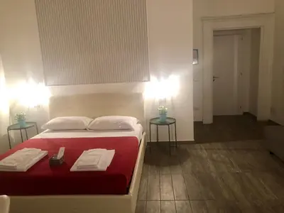 Letto o letti in una camera di B&B Martucci Avenue