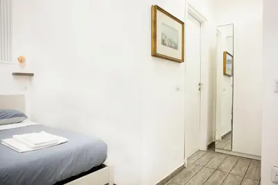 Letto o letti in una camera di B&B Martucci Avenue