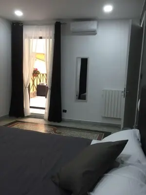 Letto o letti in una camera di MB95 - Mezzocannone Luxurious Bed&Breakfast