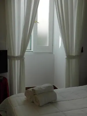 Letto o letti in una camera di Home Marty