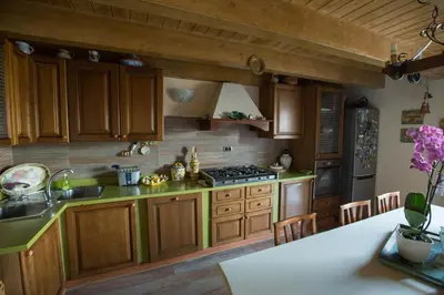 Cucina o angolo cottura di Suite Orchidea by Dimorra