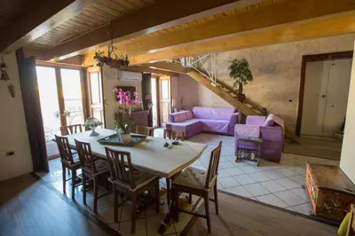 Area soggiorno di Suite Orchidea by Dimorra