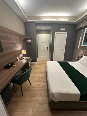 Letto o letti in una camera di 7th Floor Suite