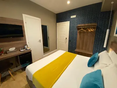 Letto o letti in una camera di 7th Floor Suite