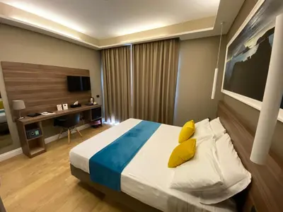 Letto o letti in una camera di 7th Floor Suite