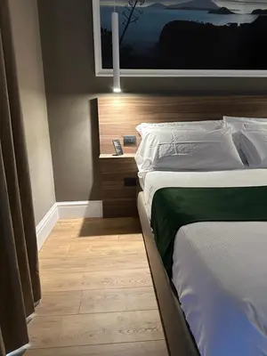 Letto o letti in una camera di 7th Floor Suite