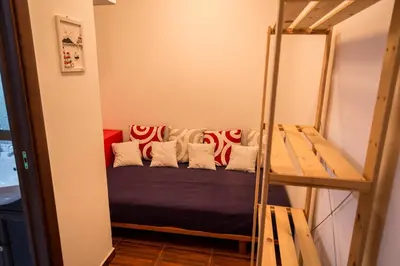 Letto o letti in una camera di Casa Lory