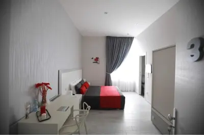 Letto o letti in una camera di Chiaia Guest House