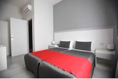 Letto o letti in una camera di Chiaia Guest House