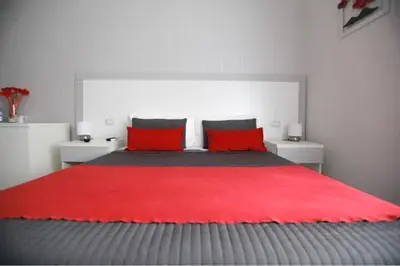 Letto o letti in una camera di Chiaia Guest House