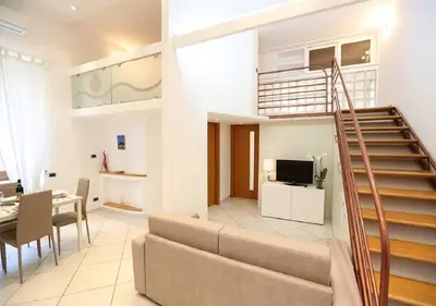 TV o dispositivi per l'intrattenimento presso Maison Mele Luxury Apartment