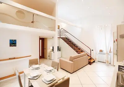 Area soggiorno di Maison Mele Luxury Apartment