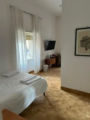 Letto o letti in una camera di Eugenia e Donato