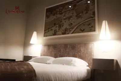 Letto o letti in una camera di B&B Le Funicolari