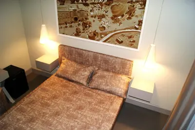 Letto o letti in una camera di B&B Le Funicolari