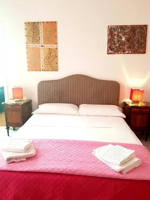 Letto o letti in una camera di B&B Platamon