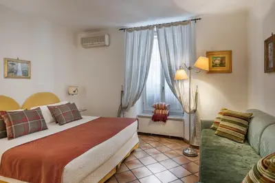 Letto o letti in una camera di Weekend a Napoli
