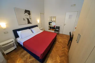 Letto o letti in una camera di Spaccanapoli Comfort Suites