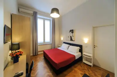 Letto o letti in una camera di Spaccanapoli Comfort Suites