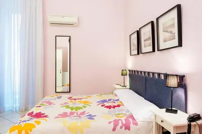 Letto o letti in una camera di BB Augusteo