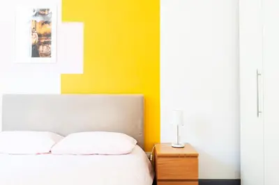 Letto o letti in una camera di Casa Conforti luminosa in centro