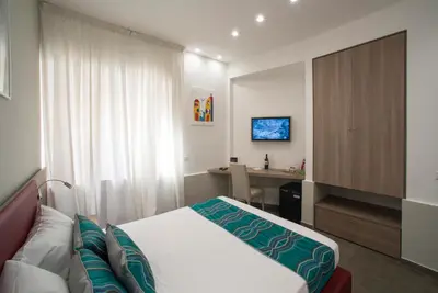 Letto o letti in una camera di Regina Margherita Suite