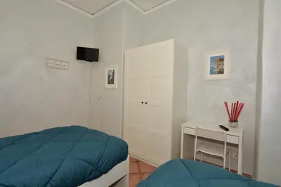 Letto o letti in una camera di Residenza Maranto