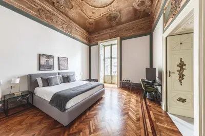 Letto o letti in una camera di Relais Della Porta