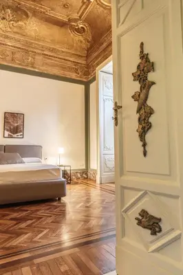 Letto o letti in una camera di Relais Della Porta