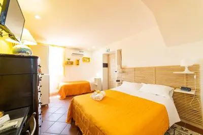 Letto o letti in una camera di Annunziata Bed and Breakfast