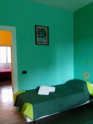 Letto o letti in una camera di B&B Napoli Leggendaria