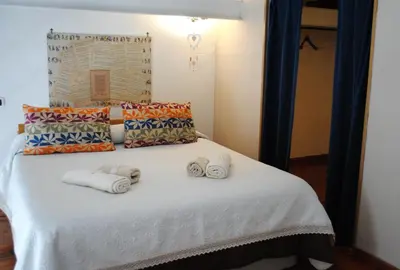 Letto o letti in una camera di Casa Luperano
