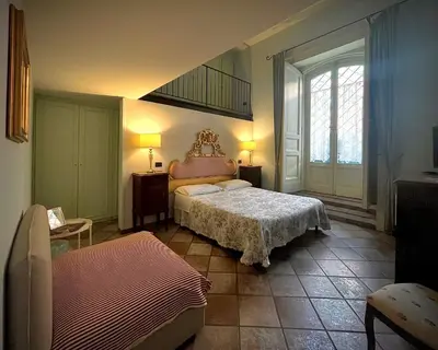 Letto o letti in una camera di B&B Palazzo Solimena