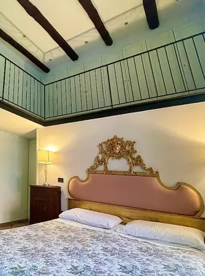 Letto o letti in una camera di B&B Palazzo Solimena