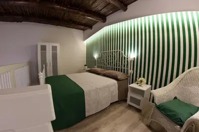 Letto o letti in una camera di Relais al Museo