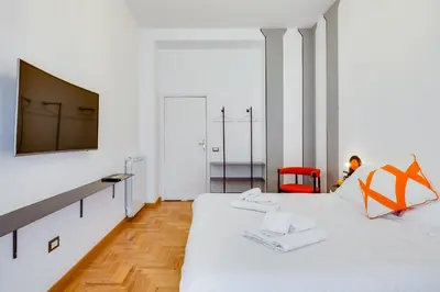 Letto o letti in una camera di ALMA de Toledo Design Home Plebiscito