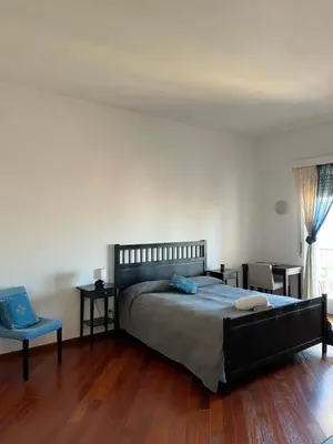 Letto o letti in una camera di Casa Olga