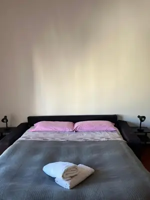 Letto o letti in una camera di Casa Olga