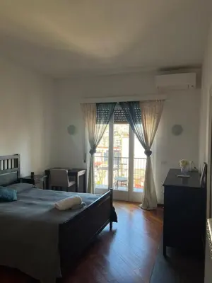 Letto o letti in una camera di Casa Olga