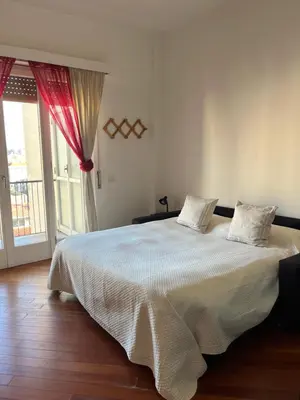Letto o letti in una camera di Casa Olga