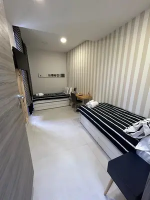 Letto o letti in una camera di 2Naples Rooms