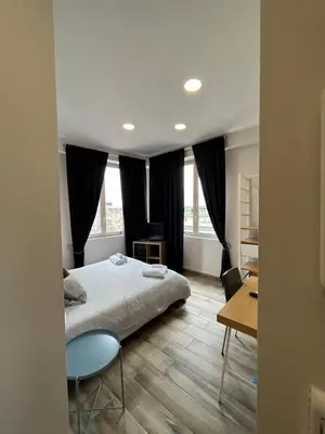 Letto o letti in una camera di 2Naples Rooms