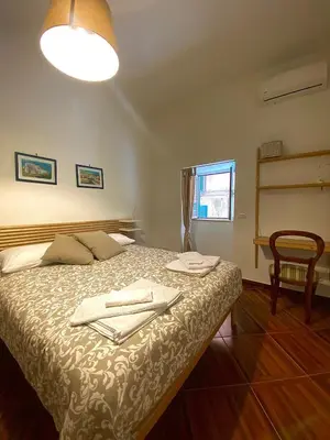 Letto o letti in una camera di Trinità degli Spagnoli house