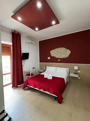 Letto o letti in una camera di Napoli Central Gate